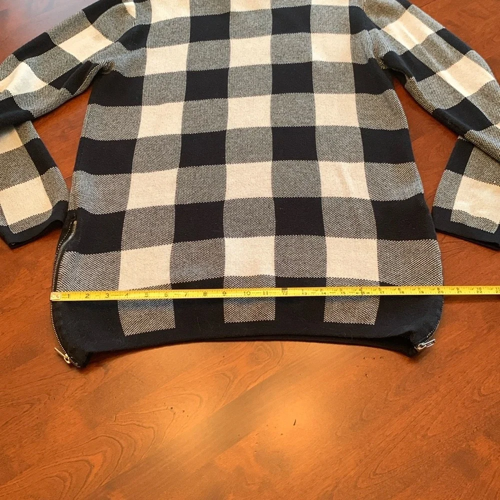 Divided Black and Cream Crewneck Sweater with Bold Check Pattern